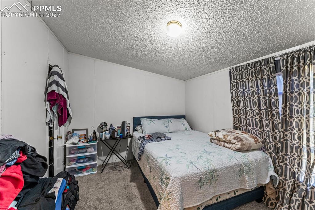Image 16 of 23: Bedroom