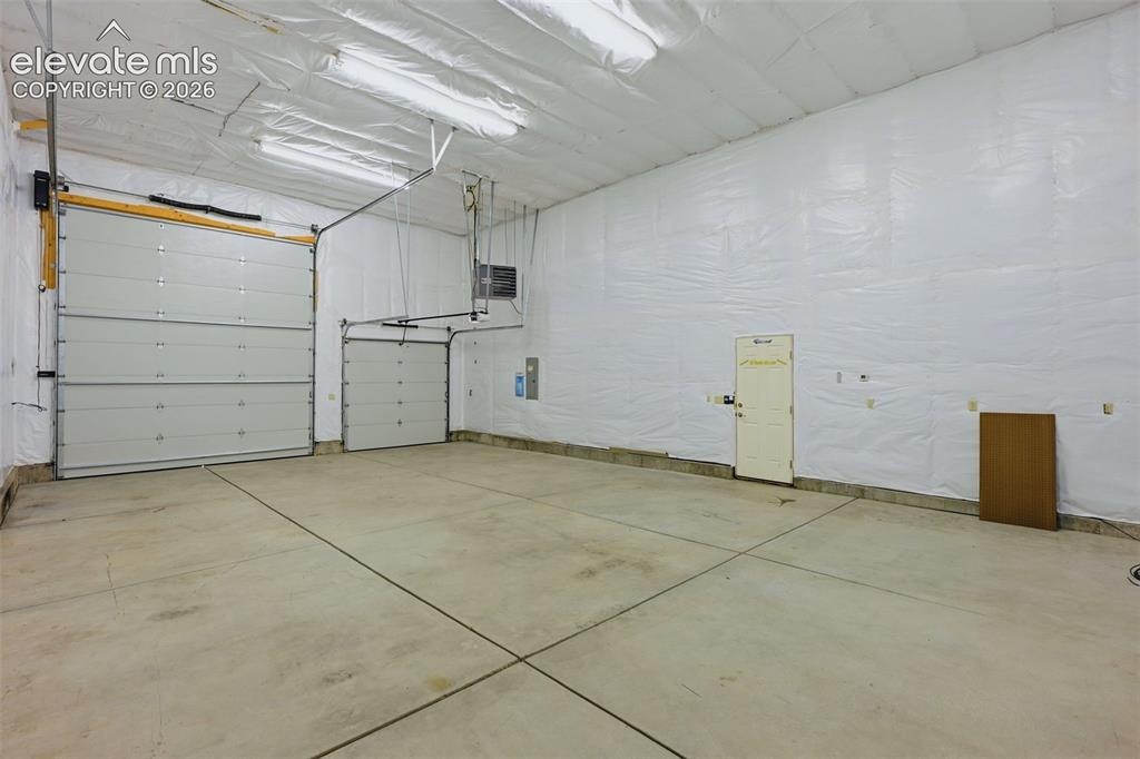 Image 38 of 46: Inside RV garage 