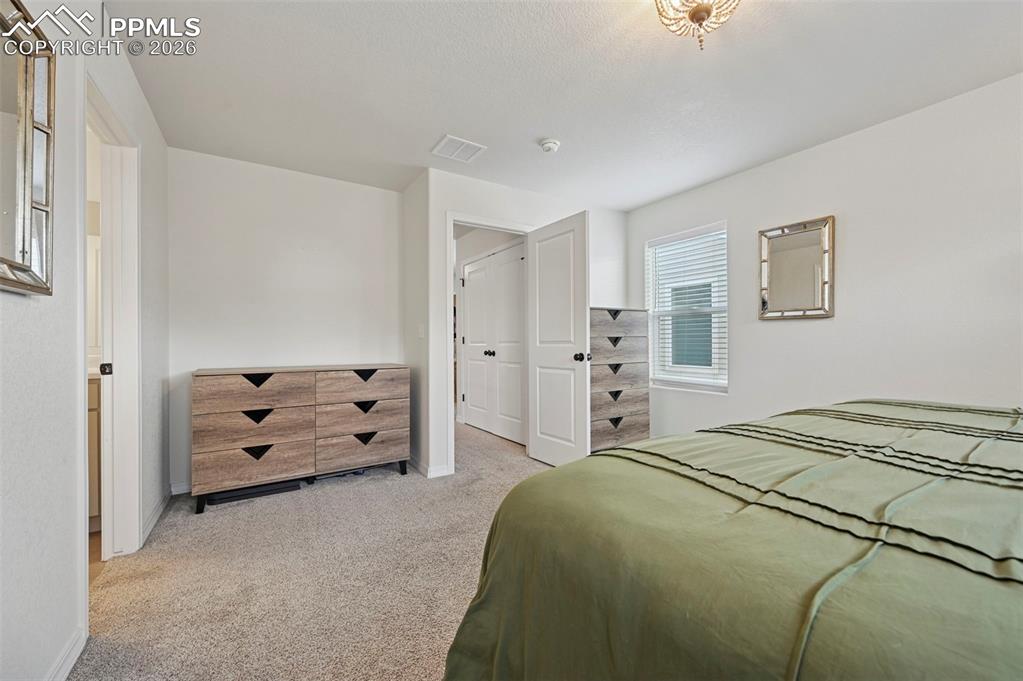 Image 21 of 30: Bedroom