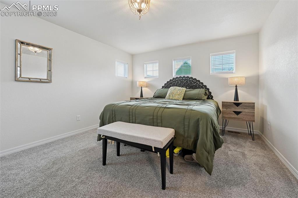 Image 22 of 30: Bedroom