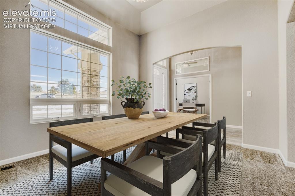 Image 13 of 50: Virtually Staged Formal Dining Room