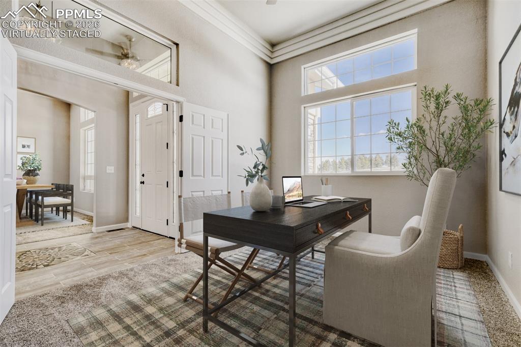 Image 15 of 47: Virtually staged Secondary Bedroom #1 or Office off the front door with ful