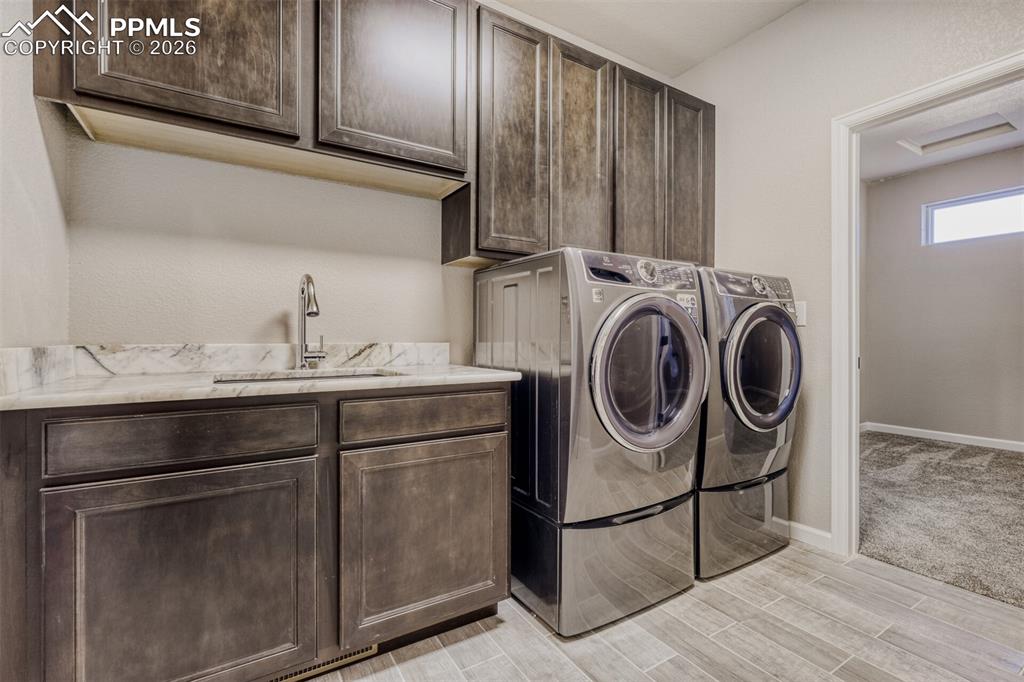 Image 29 of 47: Main level laundry