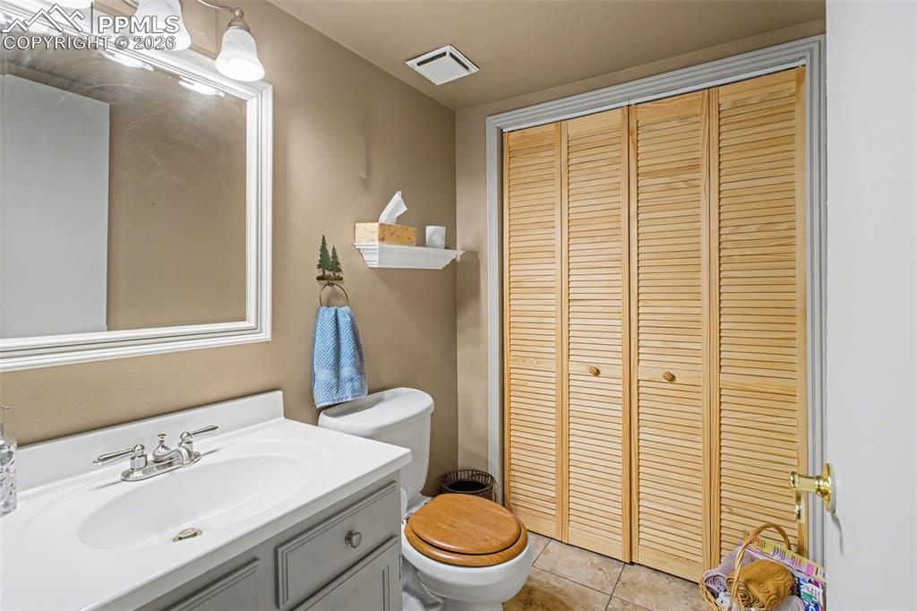 Image 15 of 30: Mechanicals Neatly Tucked Away Behind Louvered Door!