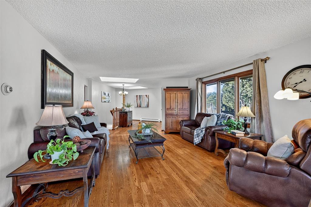 Image 20 of 48: Another view of the main level living room!