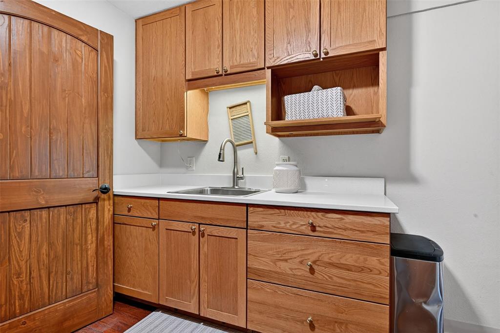 Image 34 of 48: Another view of the spacious laundry room!