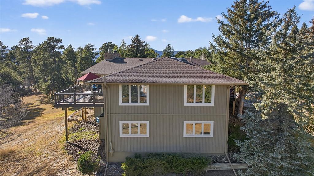 Image 47 of 48: View from east looking west showing the views from the decks!