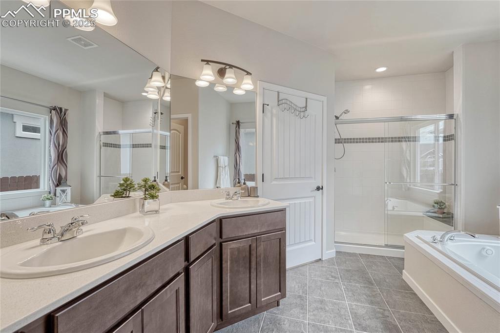 Image 28 of 49: Master Bathroom