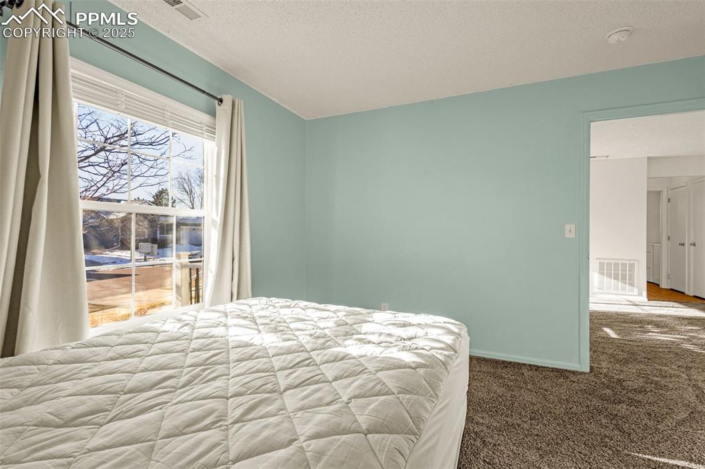 Image 10 of 26: Bedroom