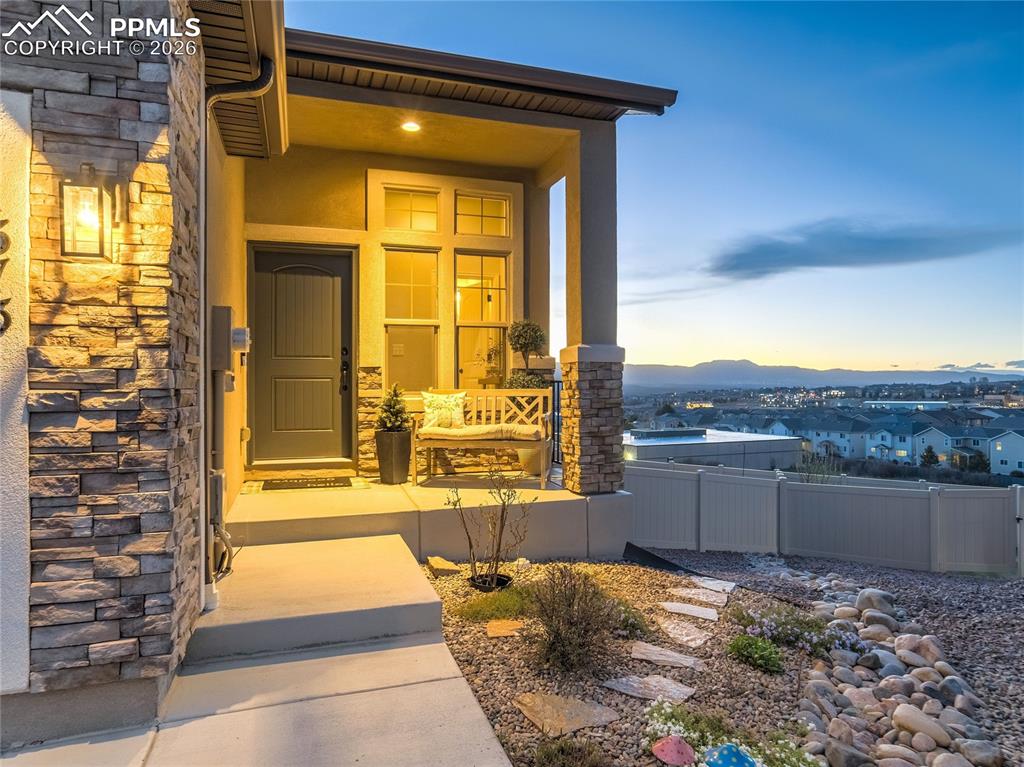 Image 2 of 45: Gracefully positioned at the corner of the community, this home enjoys no d