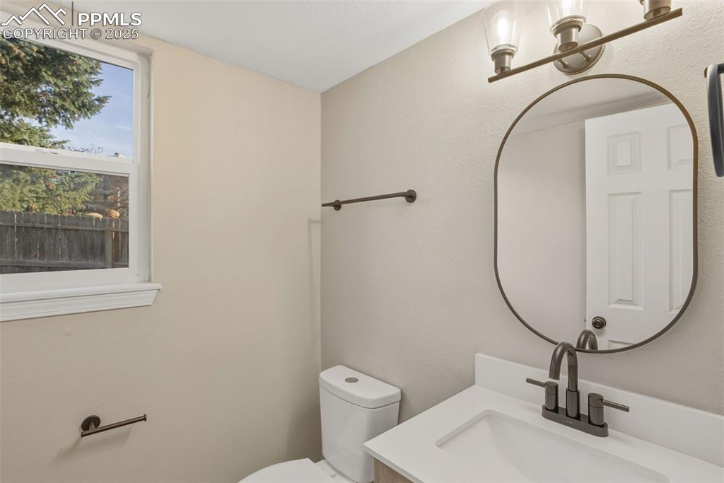 Image 18 of 31: half bath on the main level