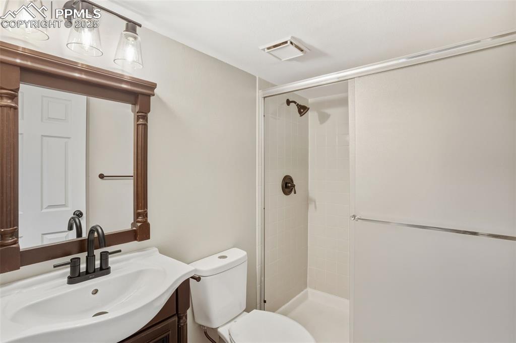 Image 22 of 31: full basement bathroom