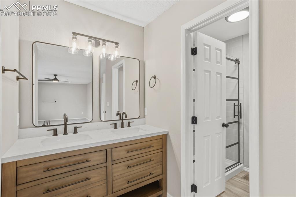 Image 4 of 31: primary suite bathroom 