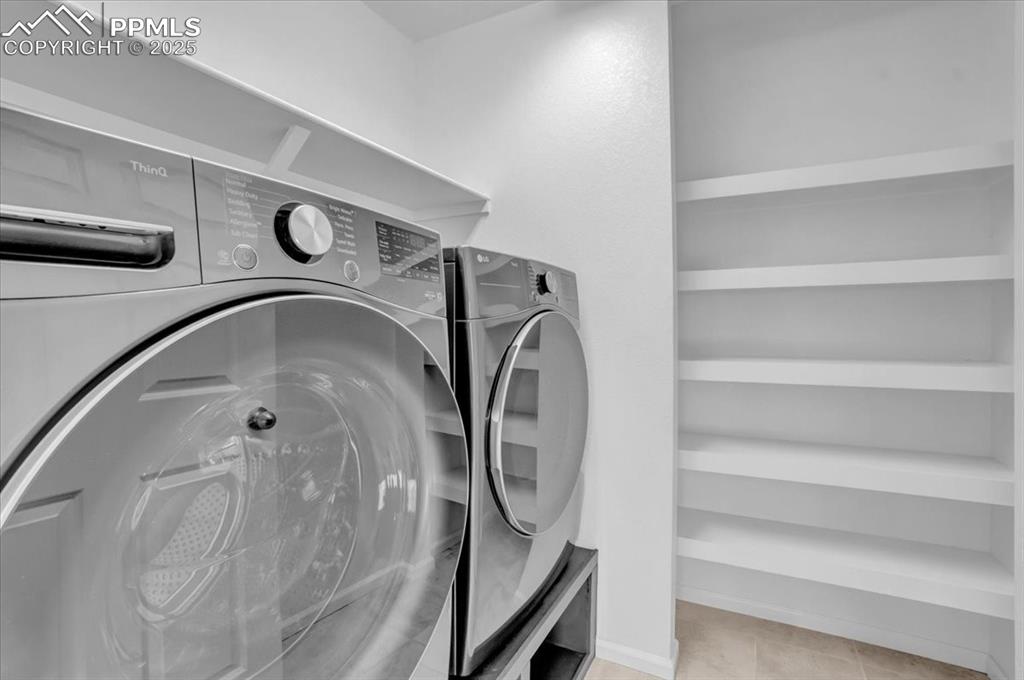 Image 24 of 36: Upstairs Laundry Room