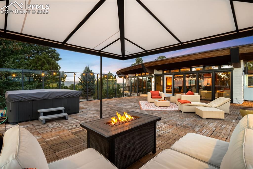 Image 20 of 39: View of patio with an outdoor hangout area
