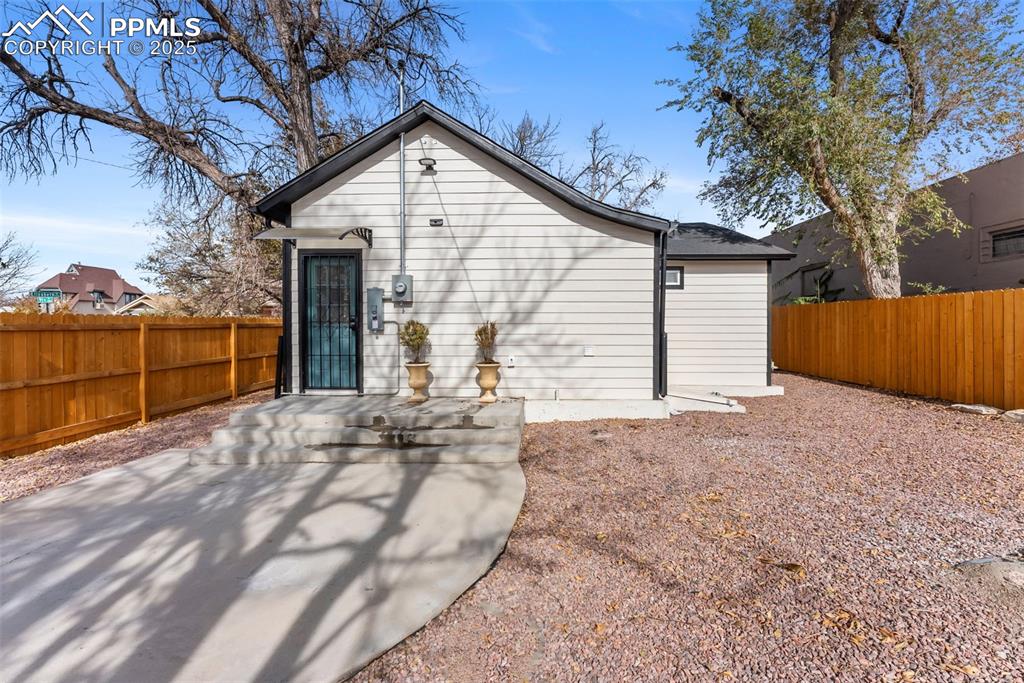Image 22 of 42: Back yard and back patio