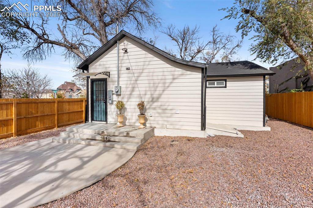 Image 24 of 42: Gain access to the unfinished basement to the right