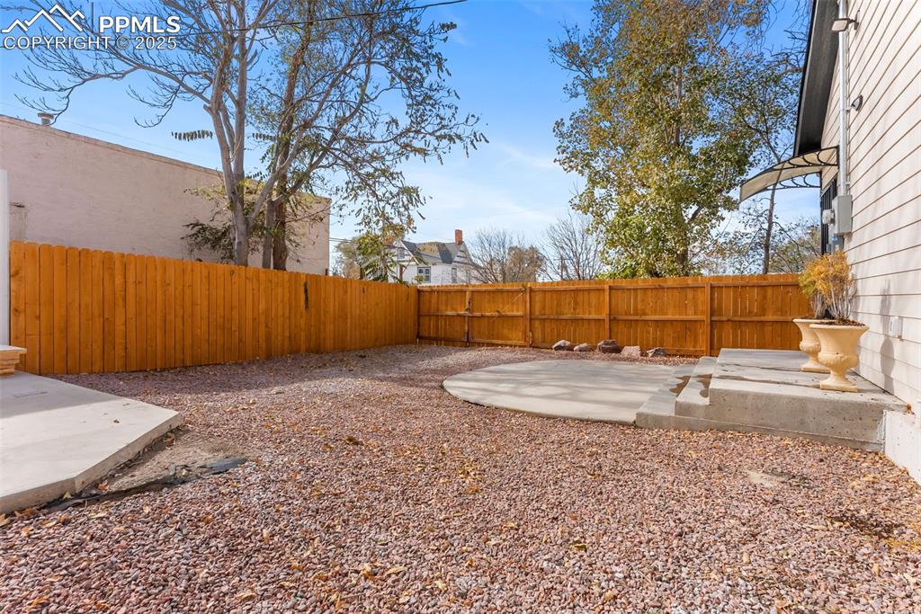 Image 26 of 42: Fully fenced lot adds privacy but also allows you to create your own oasis.