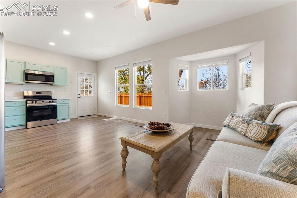 Image 7 of 42: The open layout makes accessing the kitchen, living and dining areas very e