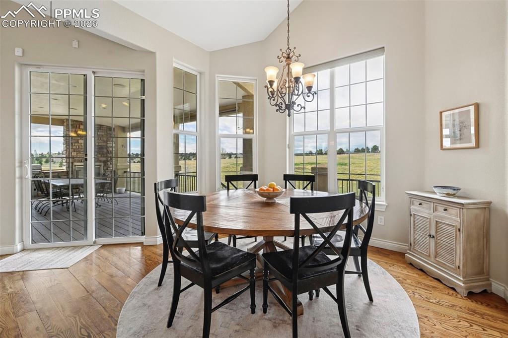 Image 14 of 50: Large eat-in dining with walkout access