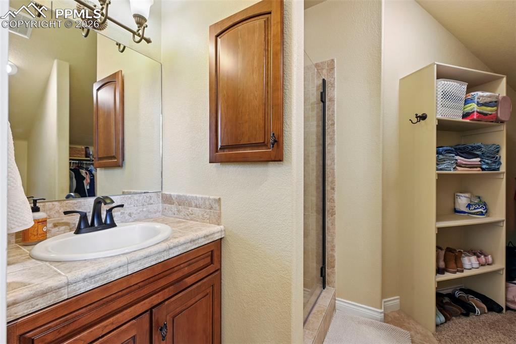 Image 28 of 50: ensuite bath for an upper level bedroom