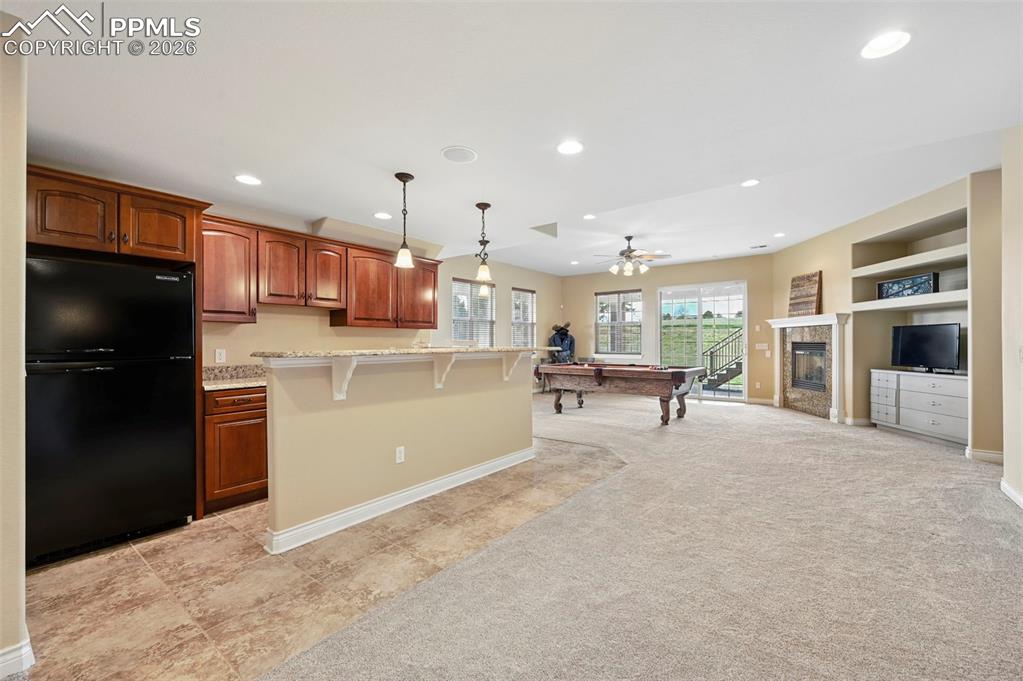Image 38 of 50: basement kitchenette