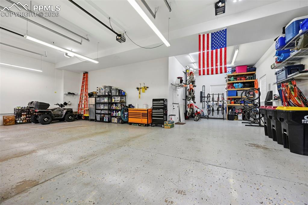 Image 42 of 50: 4-car RV garage with 12’ doors and a 40’ deep bay