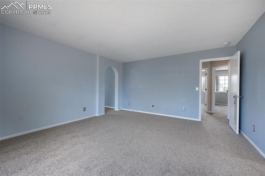 Image 18 of 37: New carpet, new trim paint, walk in closet, five piece master bath, and bon