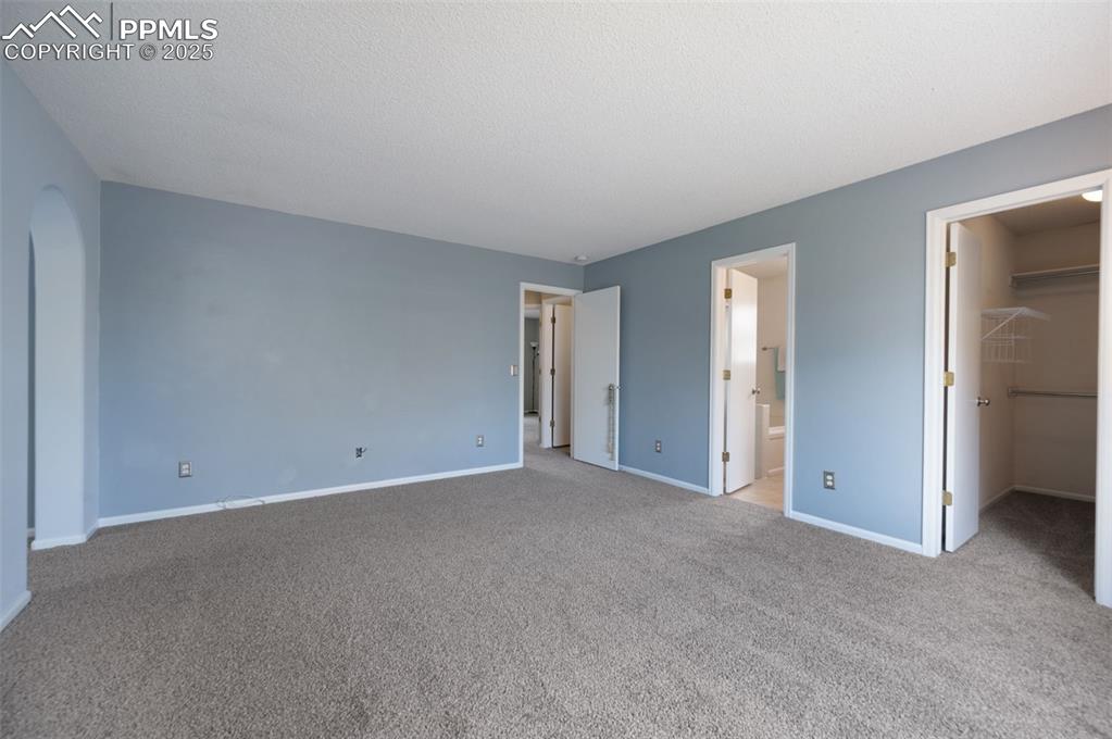 Image 19 of 37: New carpet, new trim paint, walk in closet, five piece master bath, and bon