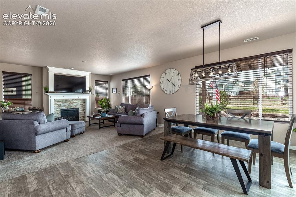 Image 13 of 45: The great room is perfect for entertaining or relaxing with family by the c