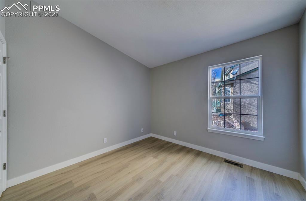 Image 21 of 33: Bedroom #2 on main level