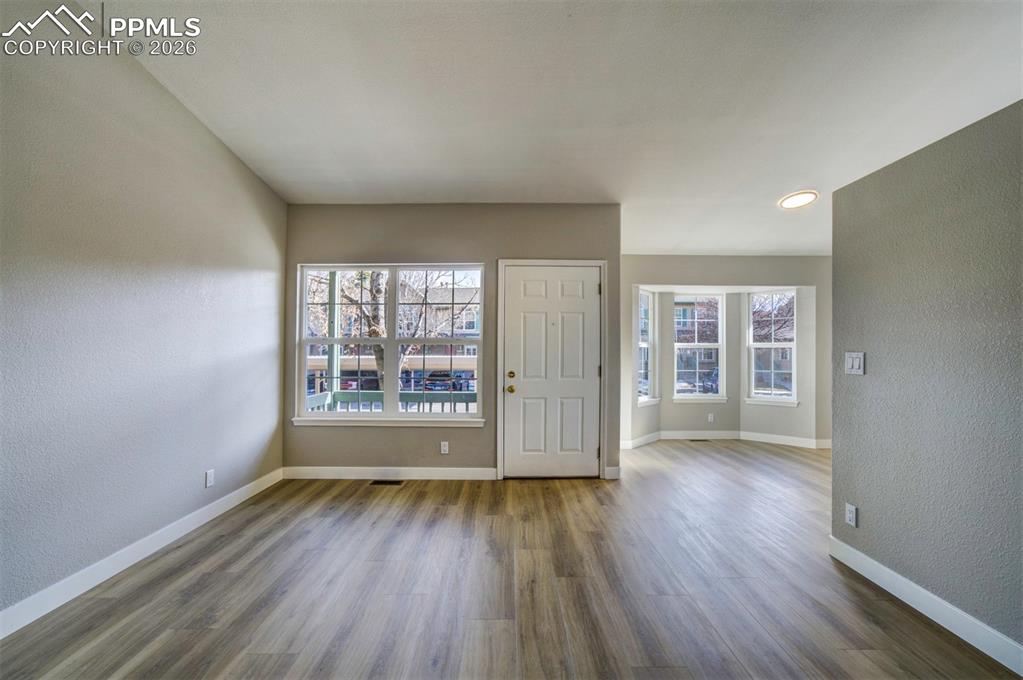 Image 6 of 33: Light and bright w/ all new windows on the main level!