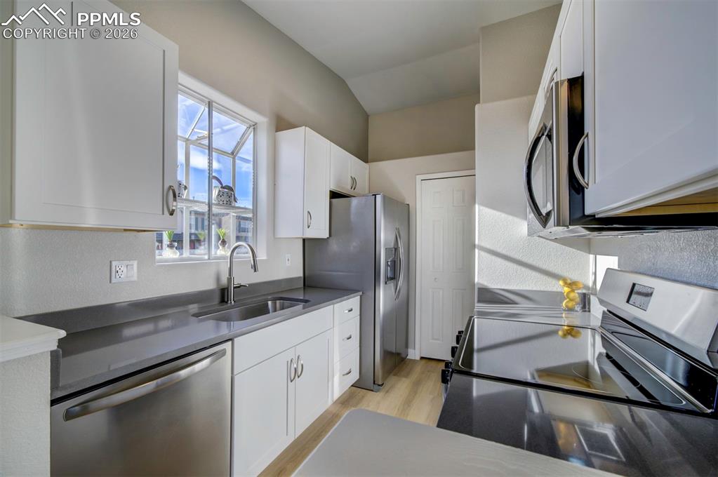 Image 8 of 33: Brand new kitchen w/ a super cute plant window box!