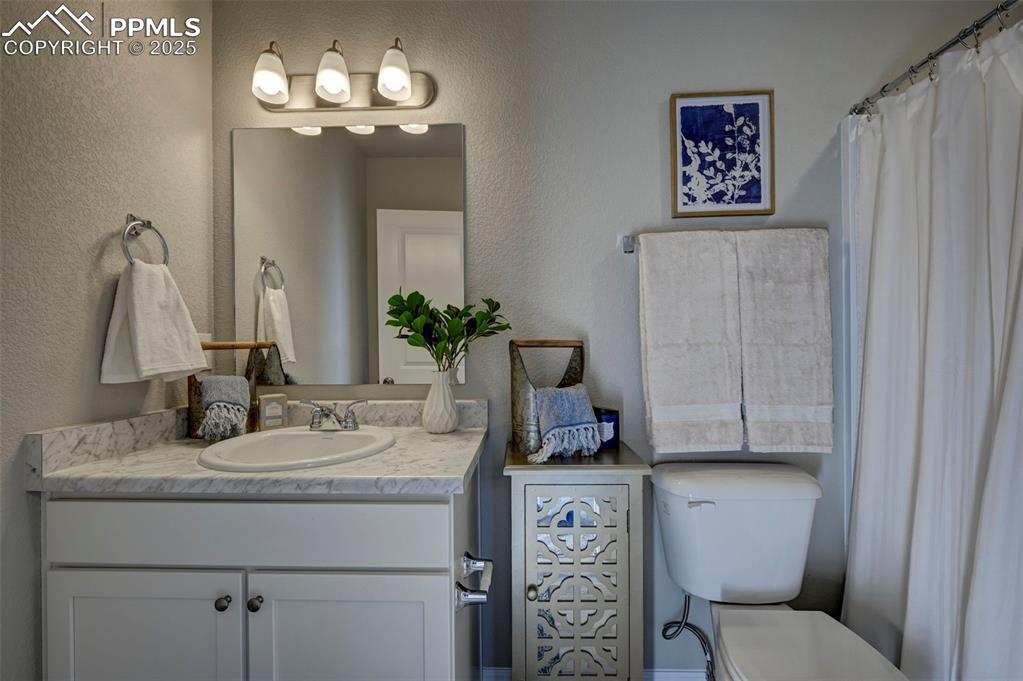 Image 14 of 23: **Photos of previous model home of same floor plan