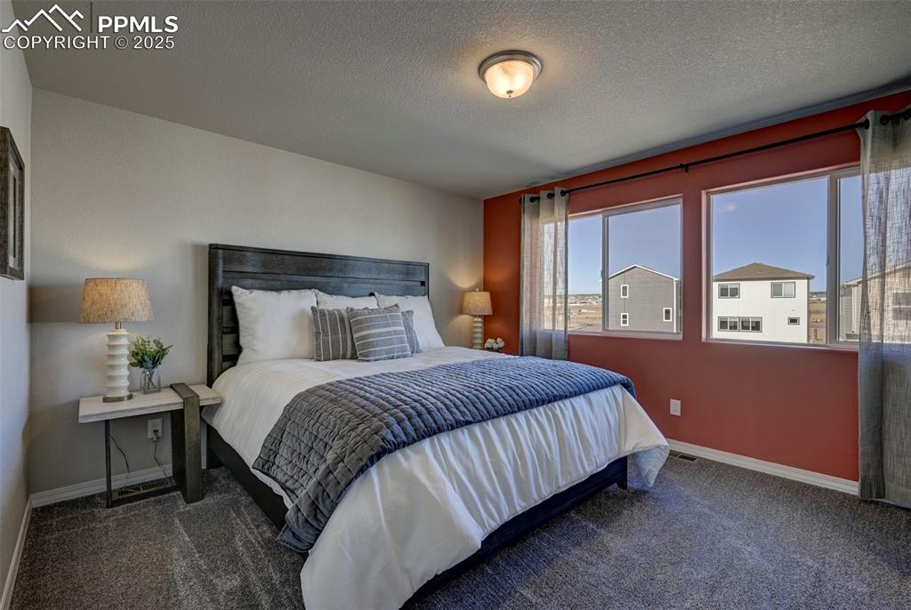 Image 17 of 23: **Photos of previous model home of same floor plan