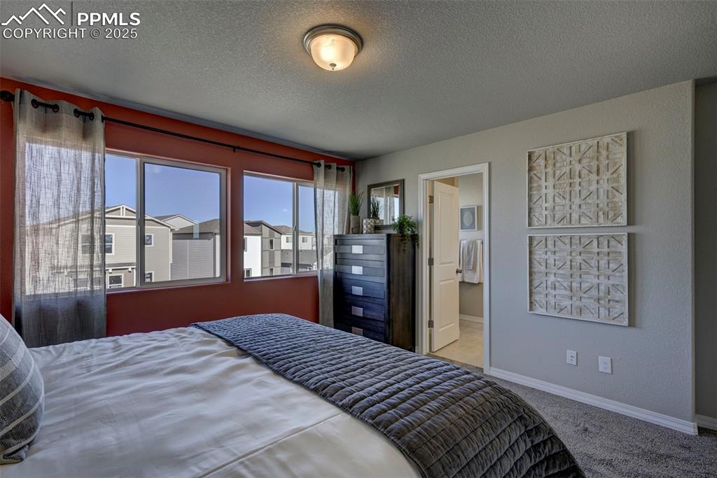 Image 18 of 23: **Photos of previous model home of same floor plan