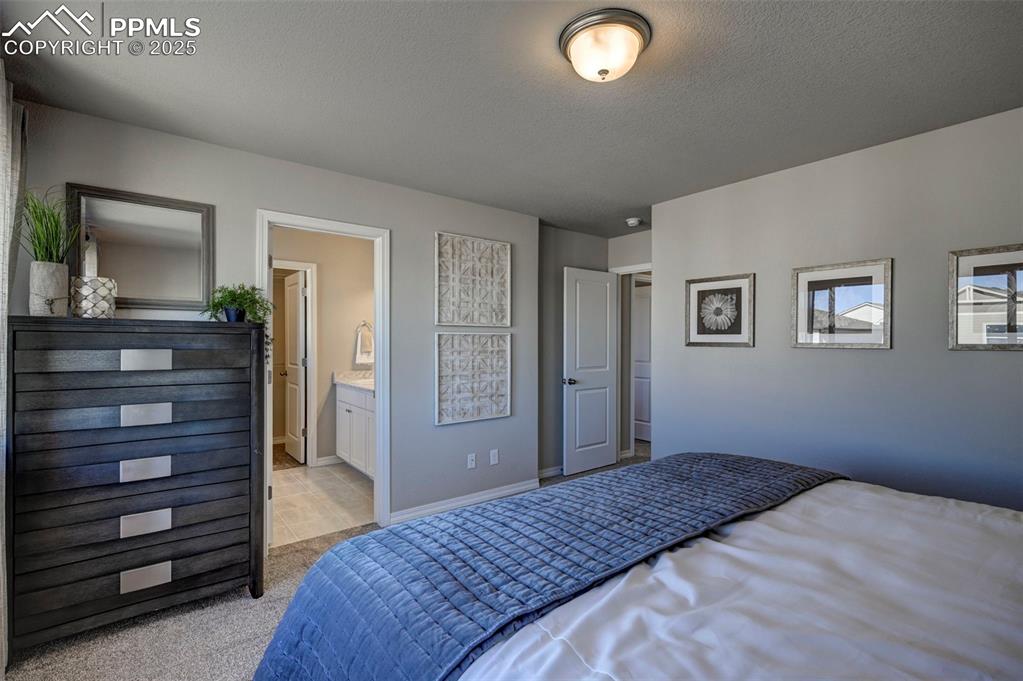 Image 19 of 23: **Photos of previous model home of same floor plan