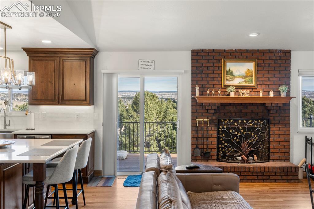 Image 11 of 46: Walk out to huge deck and amazing views.