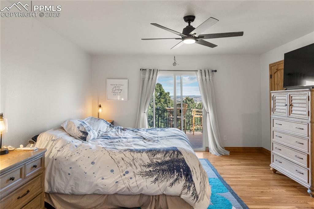 Image 22 of 46: 2nd main level bedroom suite with walk out to back deck.