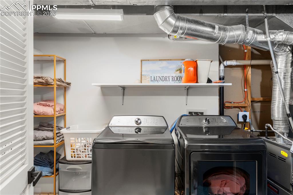 Image 29 of 46: Utility and laundry located in the basement.