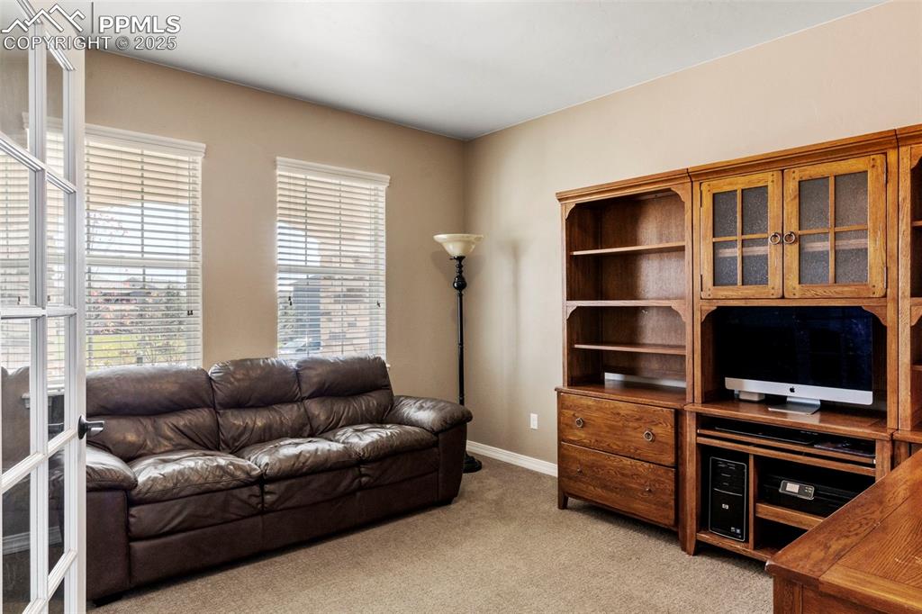 Image 20 of 41: double glass doors, over looking park