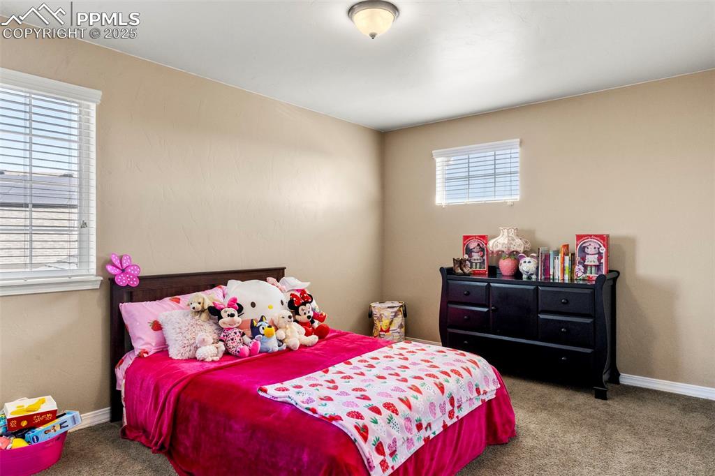 Image 27 of 41: upper bedroom with carpet