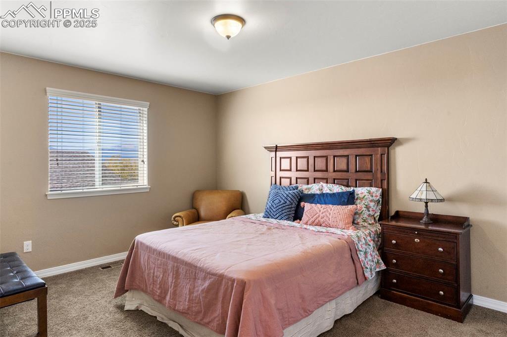 Image 28 of 41: Upper bedroom