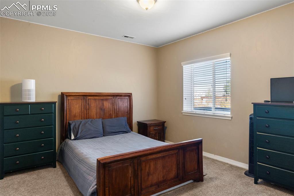 Image 34 of 41: Bedroom basement