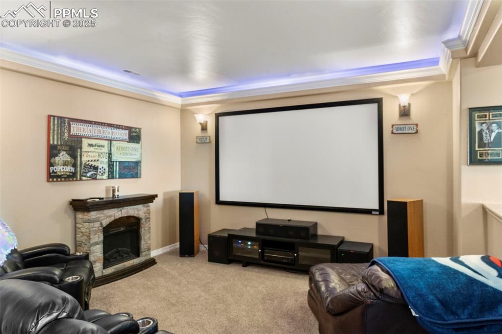 Image 37 of 41: Home theater with carpet