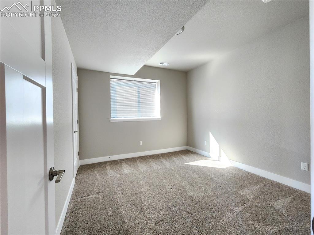 Image 31 of 50: one of the basement room