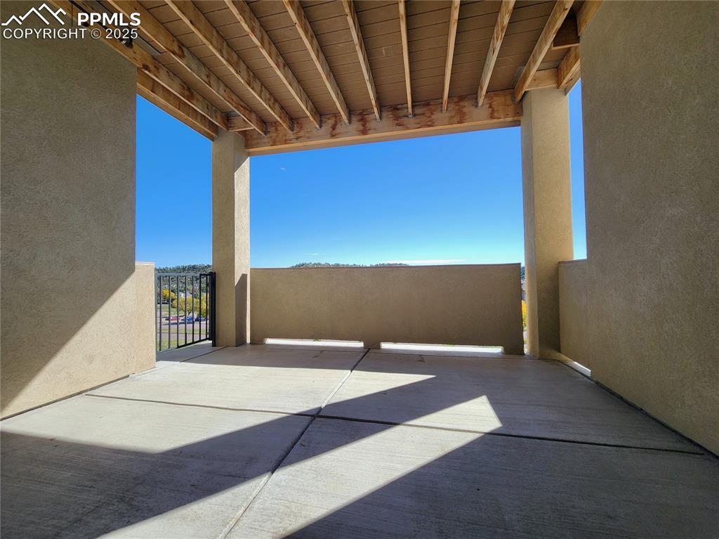 Image 39 of 50: covered concrete patio