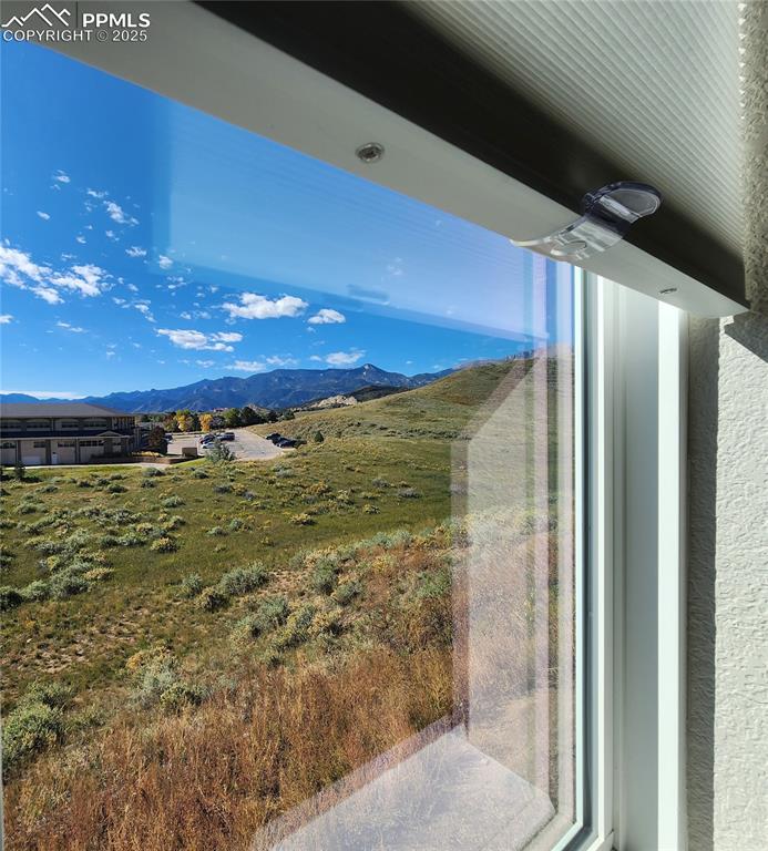 Image 8 of 50: expansive view from the dining area window, showcasing wide open vistas of 