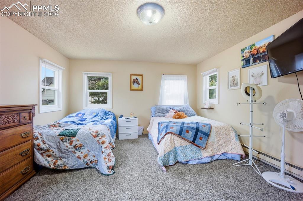 Image 12 of 33: Bedroom