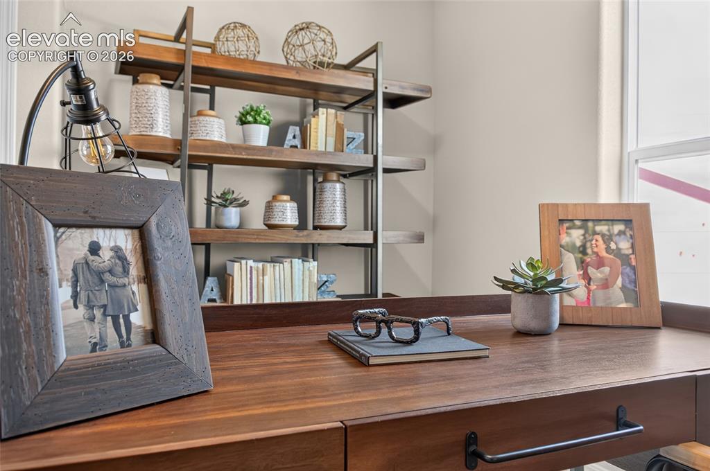 Image 39 of 45: Neutral-toned room with light beige walls and carpet flooring